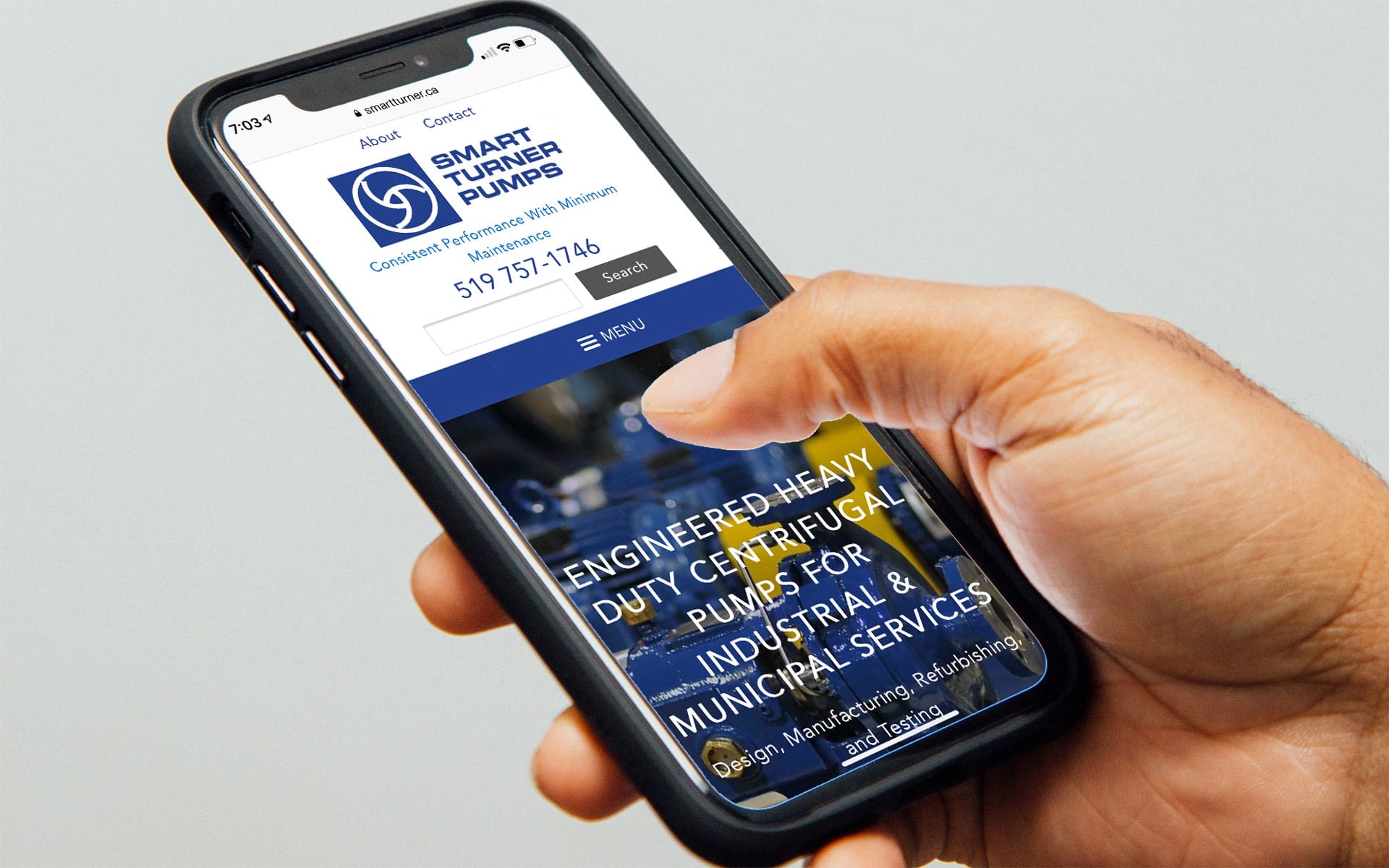 Woman's hand holding iPhone with Smart Turner Pumps home page displayed.