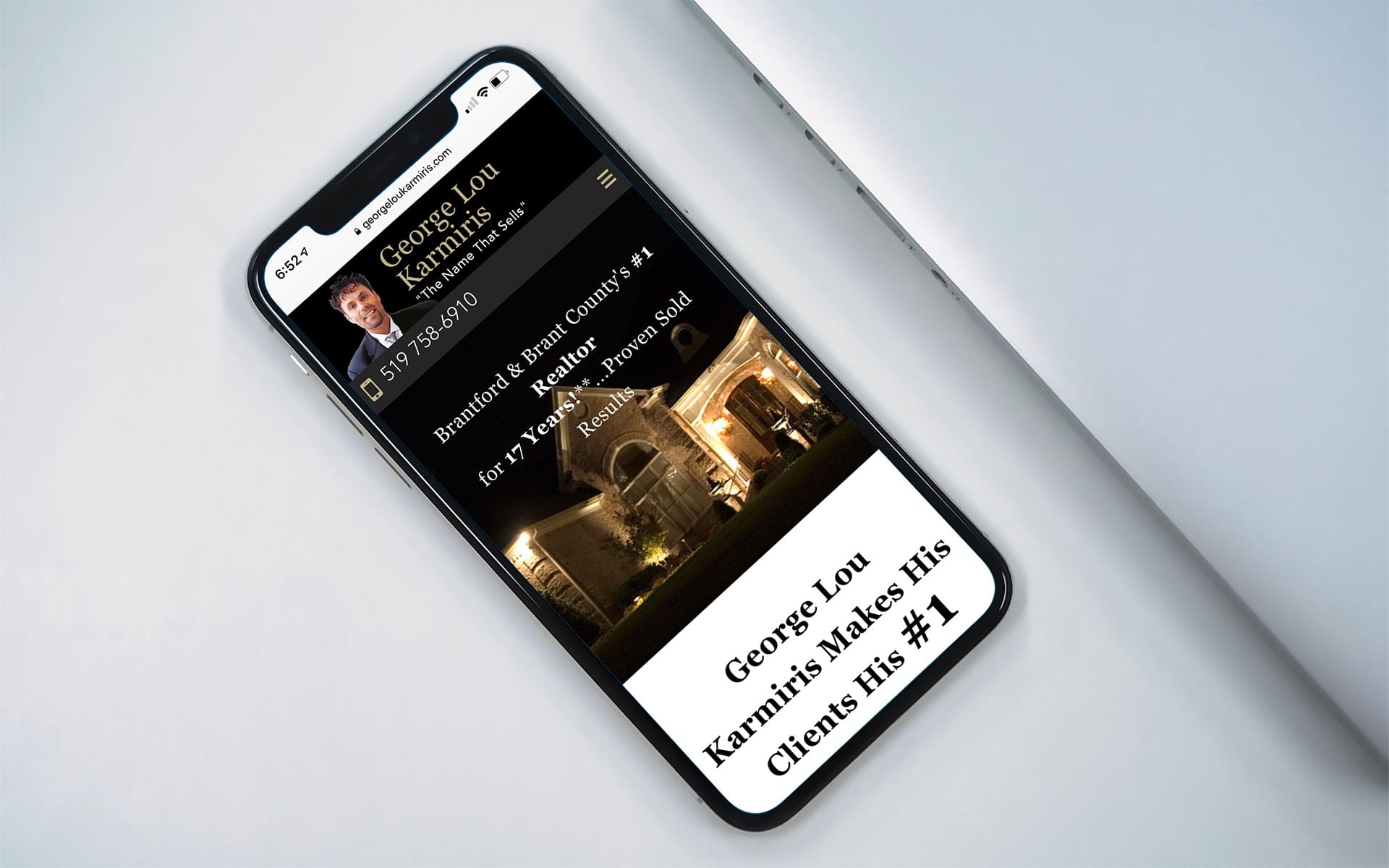 Mock-up of georgeloukarmiris.com showing iPhone layout.