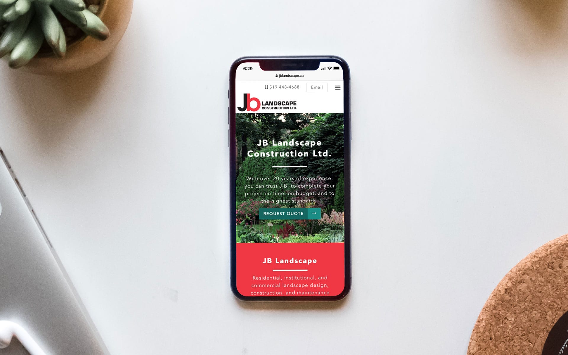 Mock-up of JB Landscape web site on an iPhone.