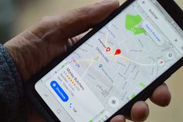Mobile phone displaying google maps with a business listing.