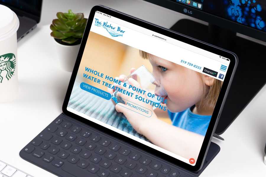 Web design mock-up of The Water Bar website showing layout on iPad.