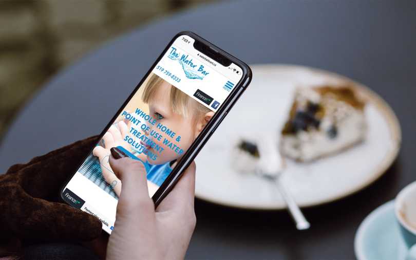 Web design mock-up of The Water Bar website showing layout on iPhone.